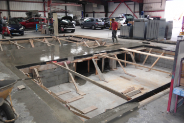 Atelier en site occupé, fosses dans une carrosserie pour installation cabines de peintures